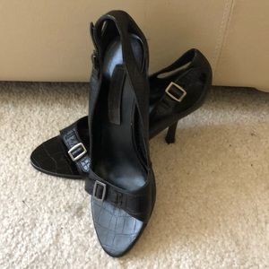 Black open toe buckled heels